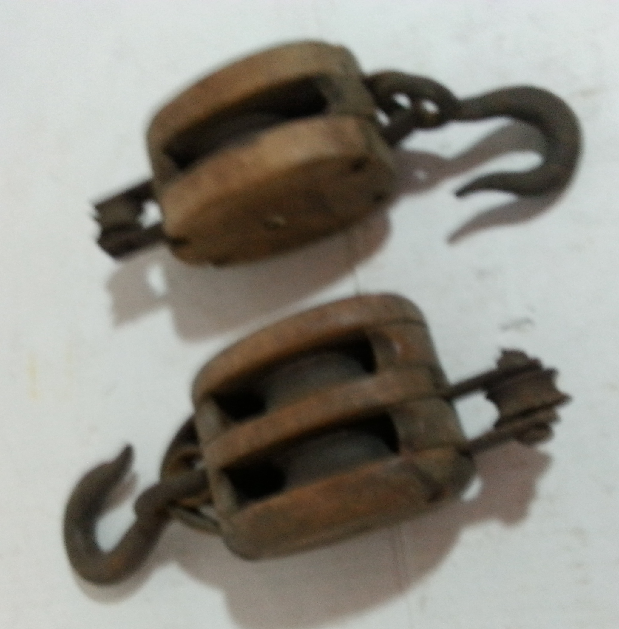 antique wooden pulleys